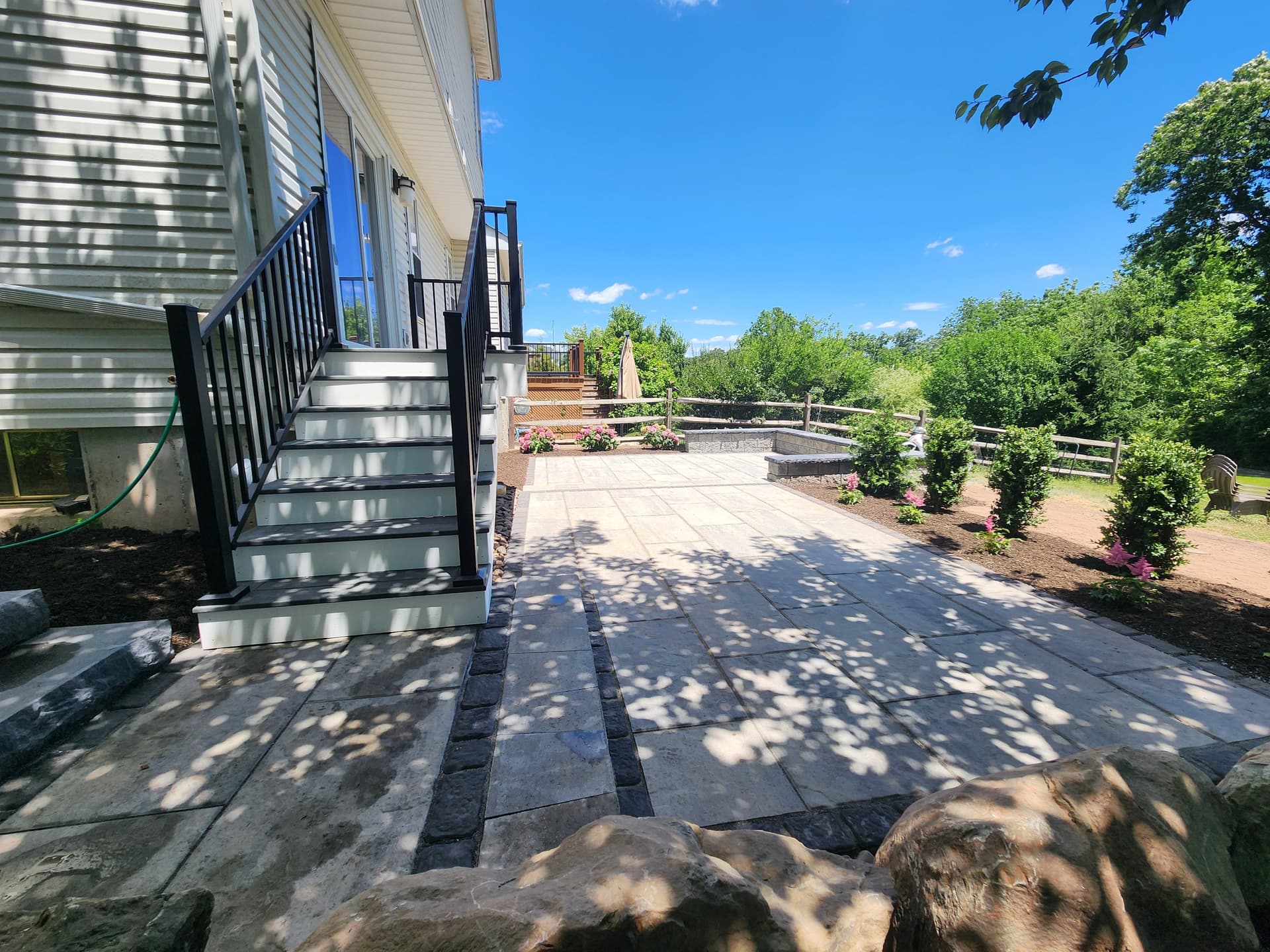 Gallery photos for Old Deck Out, New Deck and Two-Level Paver Patio In: Image #1