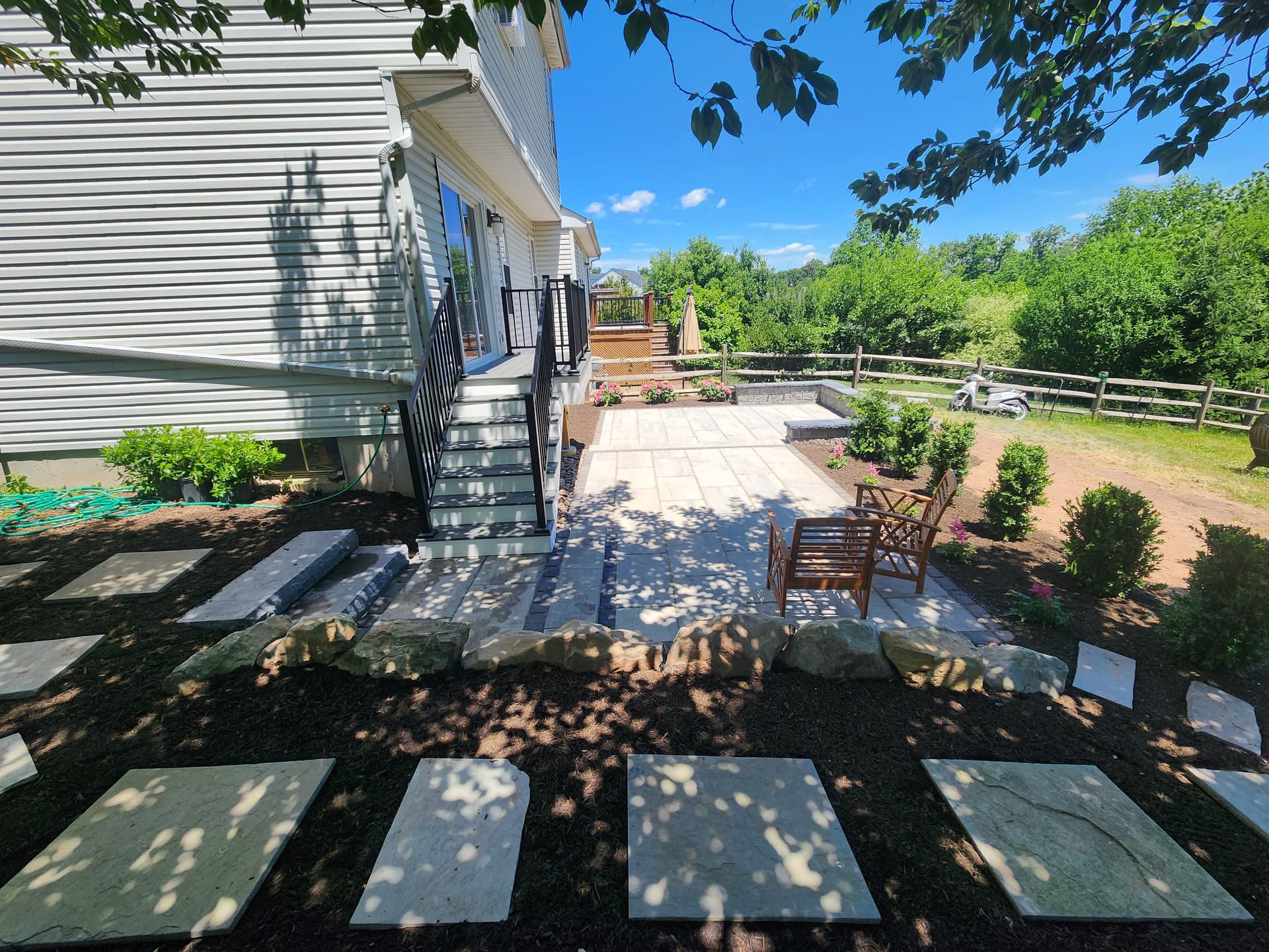 Gallery photos for Old Deck Out, New Deck and Two-Level Paver Patio In: Image #4