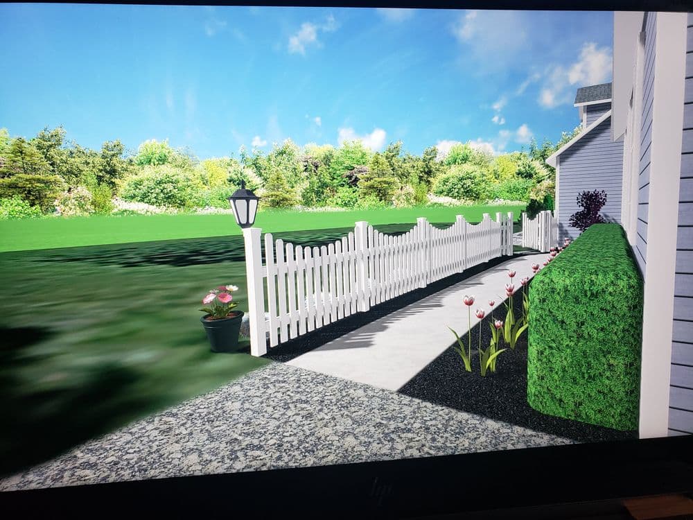 3D rendering of a garden pathway with white picket fence, bushes, flowers, and lamp post.