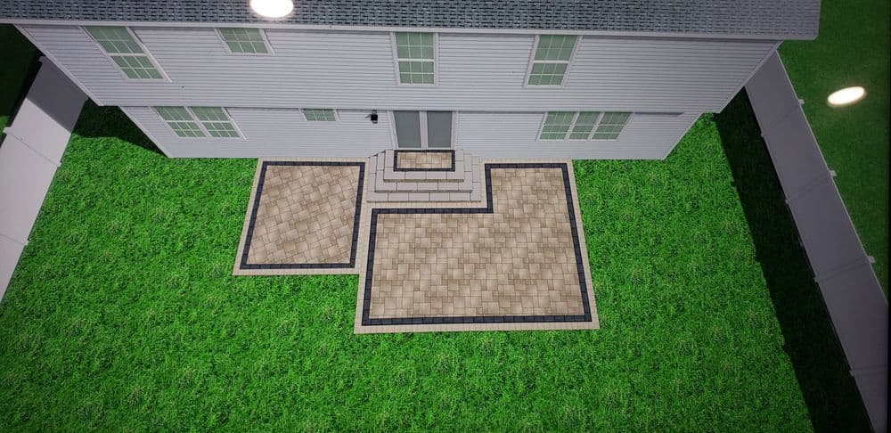 Aerial view of a two-story house with a landscaped yard and patterned stone patio.