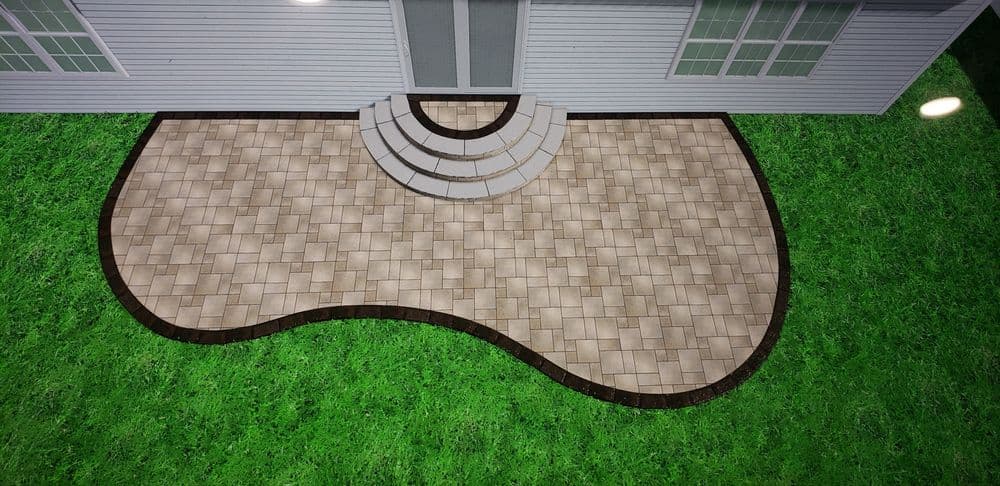 Paved patio design with curved edges, featuring stone steps and green lawn backdrop.