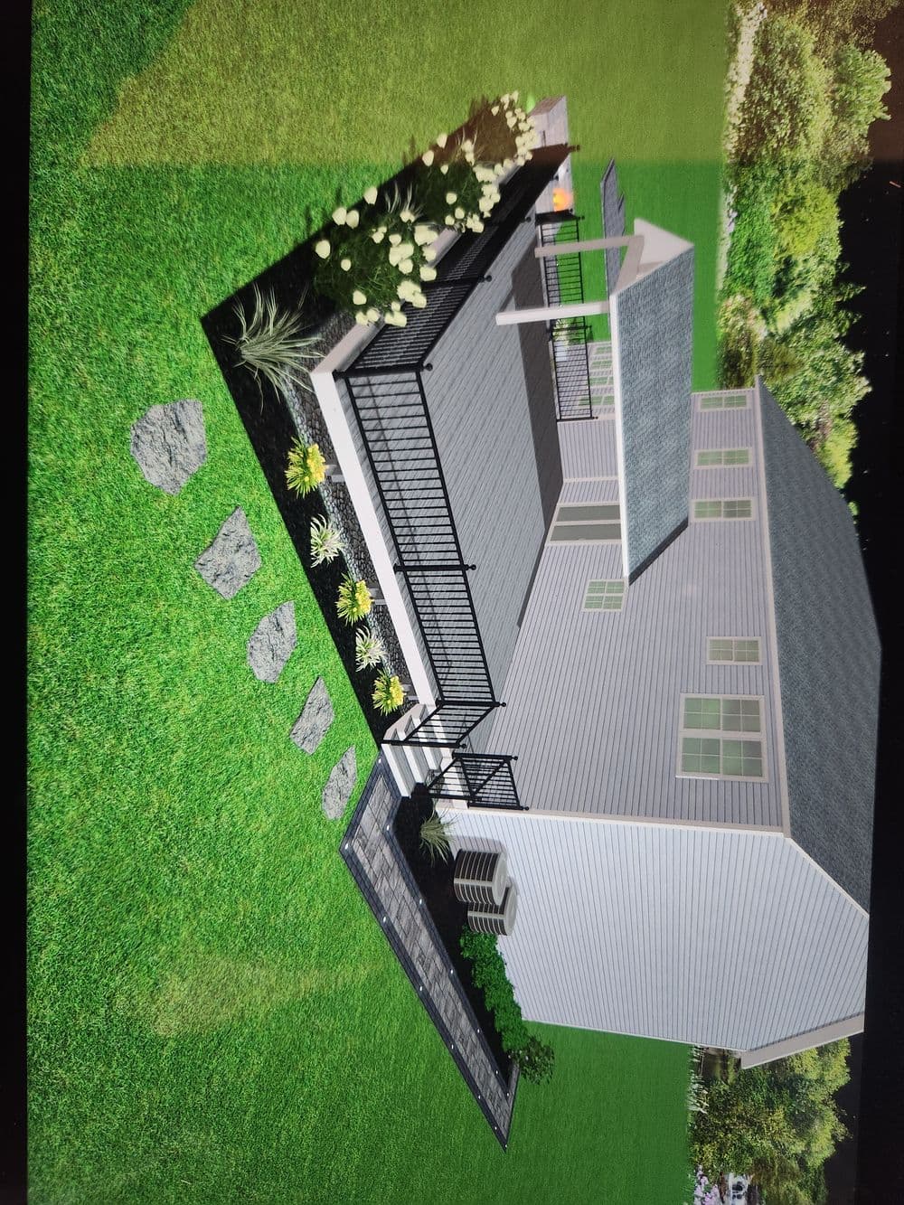 3D rendering of a modern home with landscaped garden and stone pathway. Outdoor patio visible.