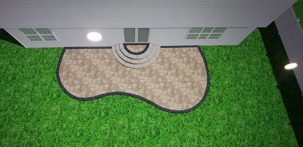 Aerial view of a modern patio design with curved paver stones near a house on green grass.