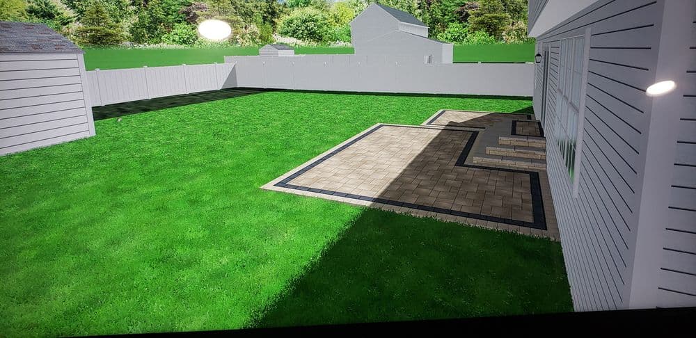 Backyard with green lawn, patio area, and landscaping features, ideal for outdoor living.